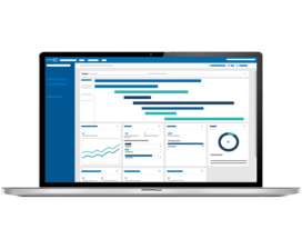 A laptop displaying a dashboard interface with bar charts, line graphs, pie chart, and various data widgets in a blue and white color scheme.